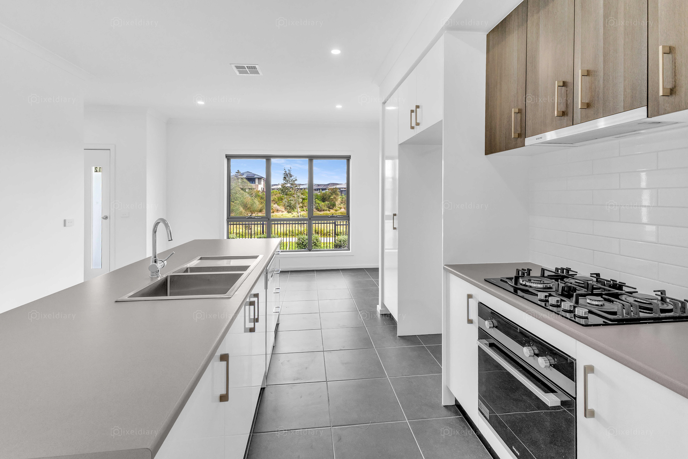 Minimal white kitchen with modern finishes