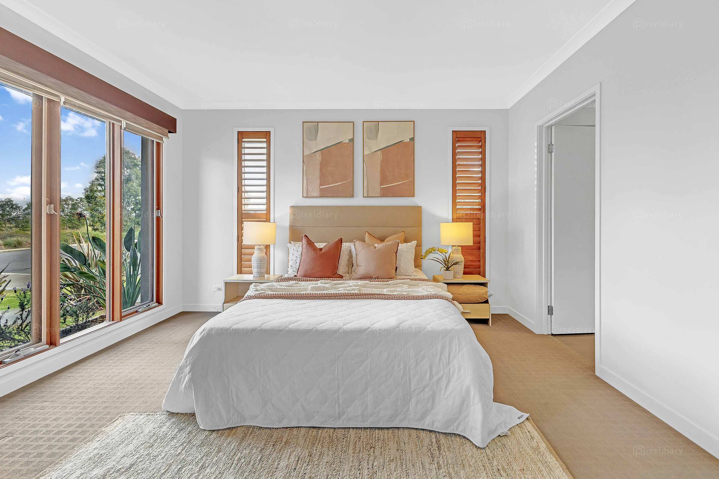 Spacious bedroom with timber-framed windows