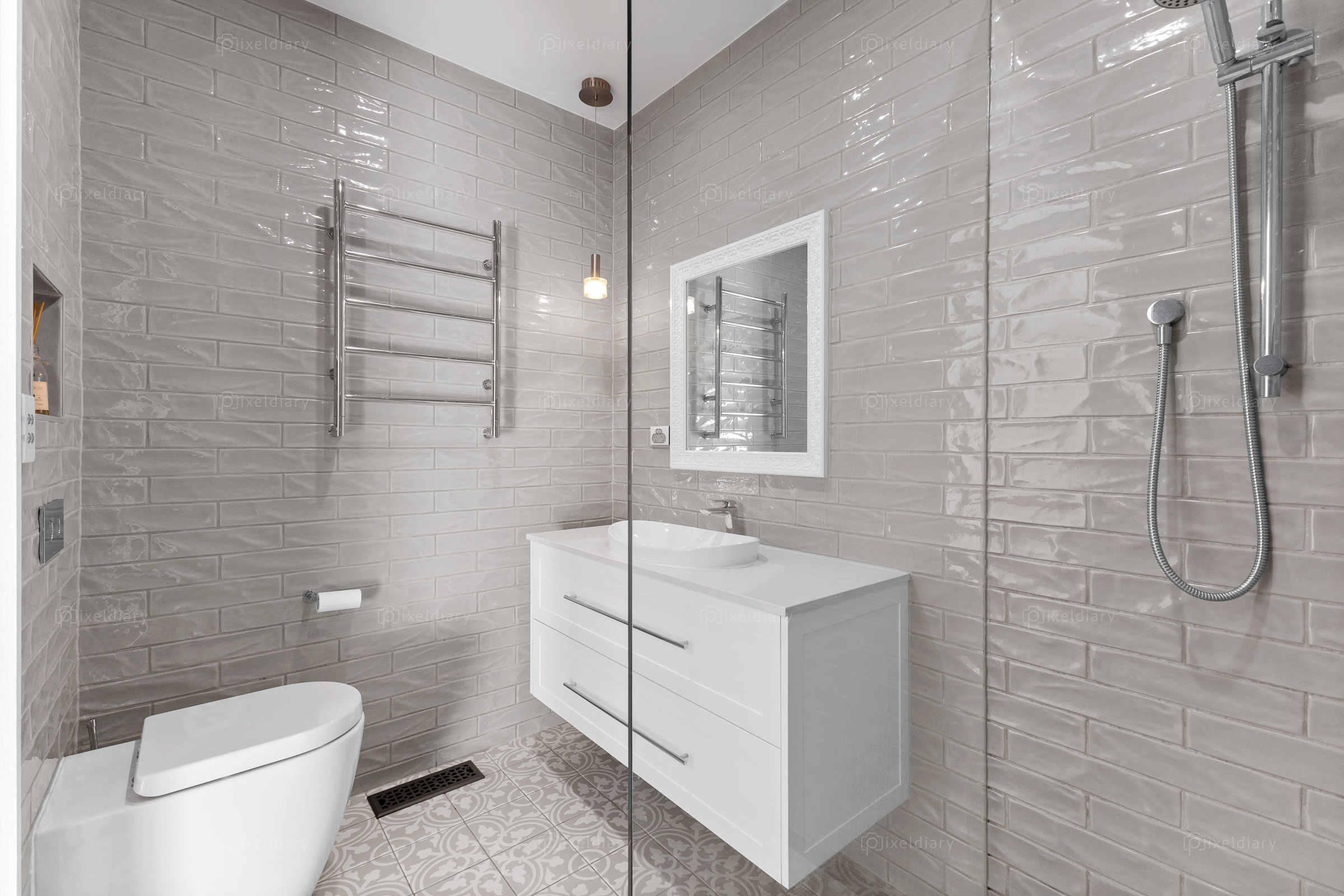 Architectural bathroom with patterned floor tiles