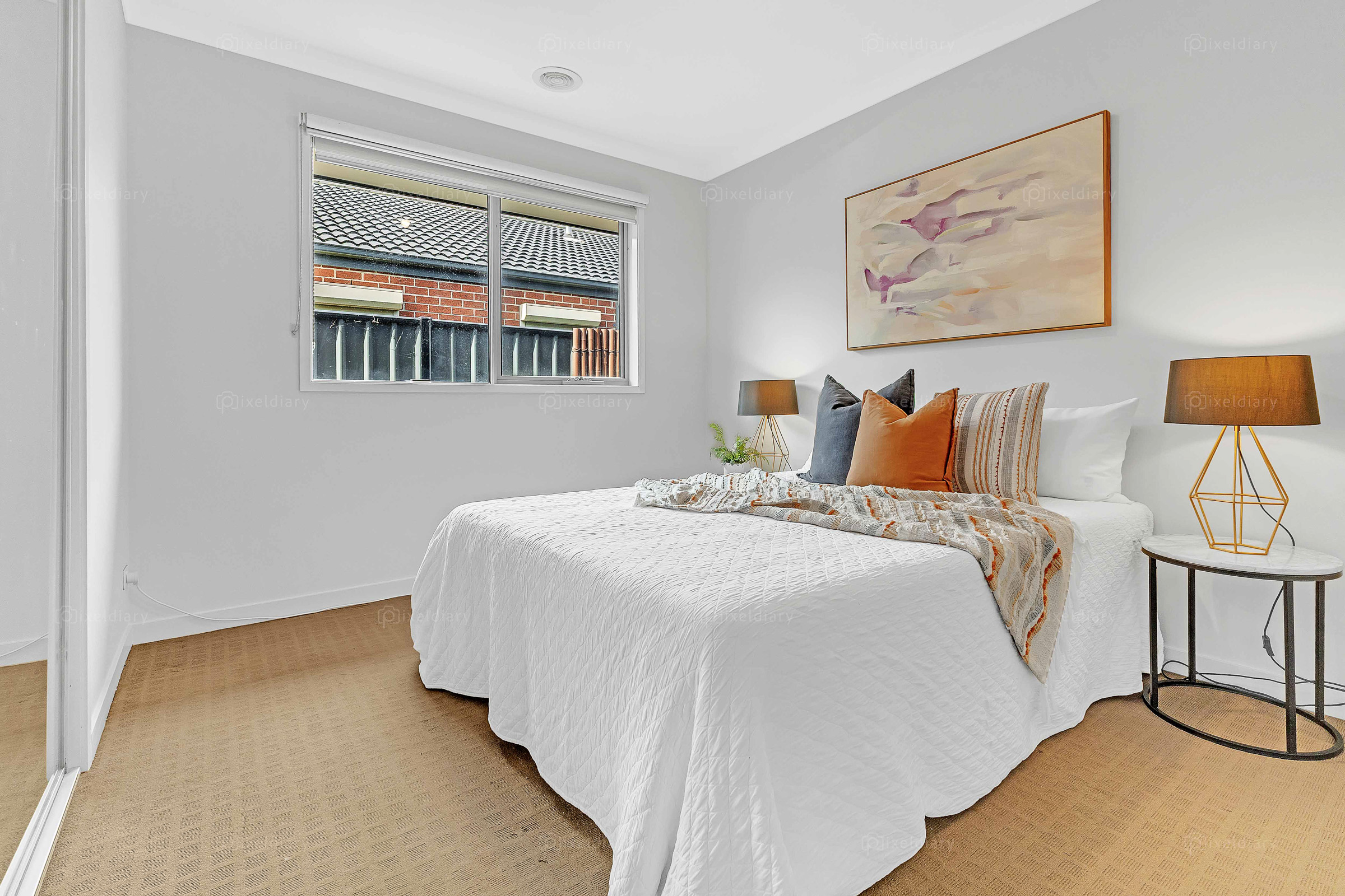 Bedroom with warm orange accents