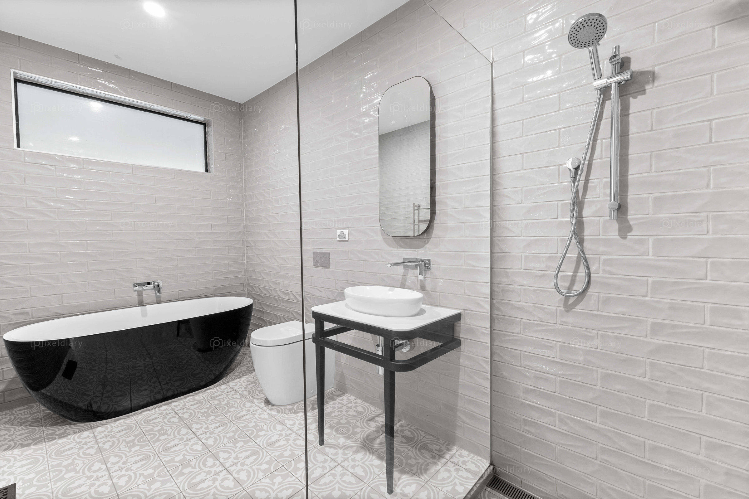 Monochrome bathroom with freestanding bath